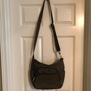 FINAL CLEARANCE.  Olive colored Travelon Bag (see second pic for better color)